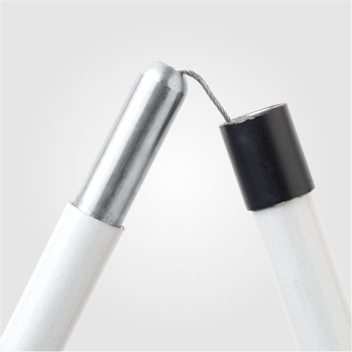A folding cane with a red roller ball tip, designed for use on various terrains, including uneven surfaces and outdoors. Ideal for people with disabilities.