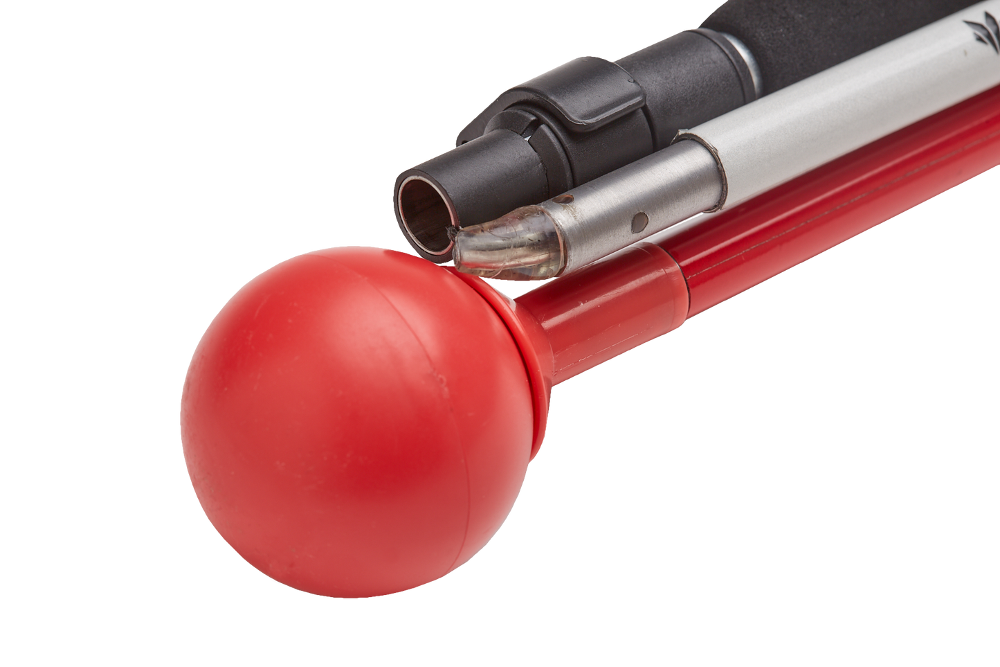 A close-up of a red roller ball tip for a cane. The tip is designed to provide smooth movement and stability on various surfaces.