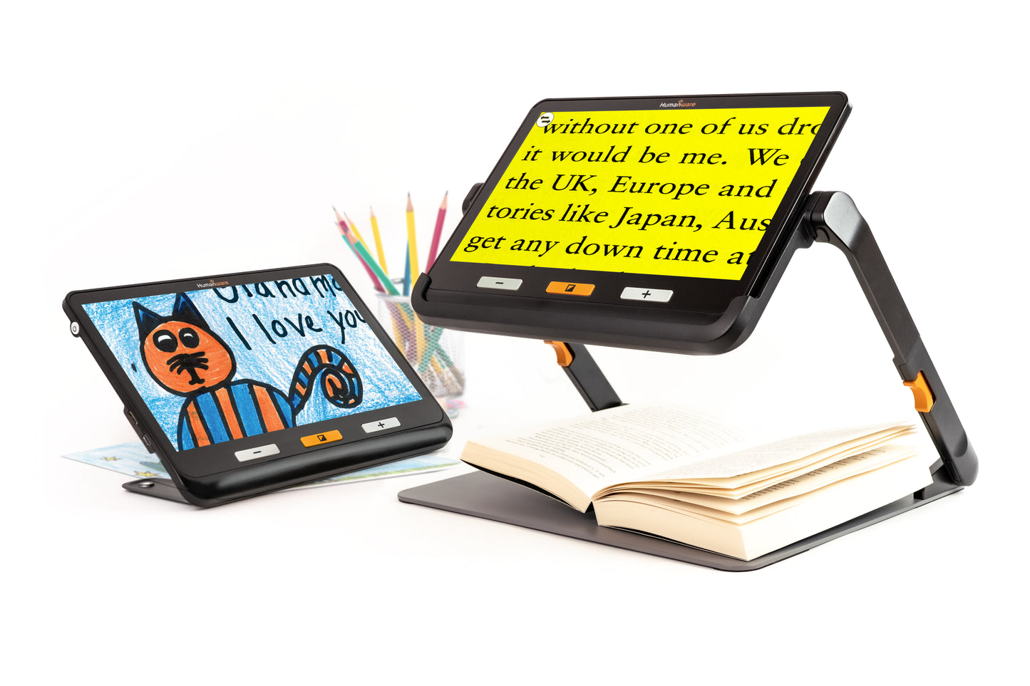 A portable video magnifier, the Humanware Explore 12, is shown magnifying a book. The device has a large screen and adjustable stand.