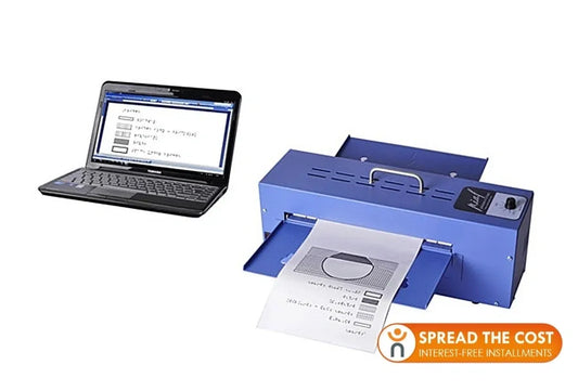 A blue, industrial-looking machine with a paper feed and a handle. A laptop connected to it shows a preview of a tactile graphic. The machine is used for creating tactile graphics for visually impaired people and is available at floridareading.com