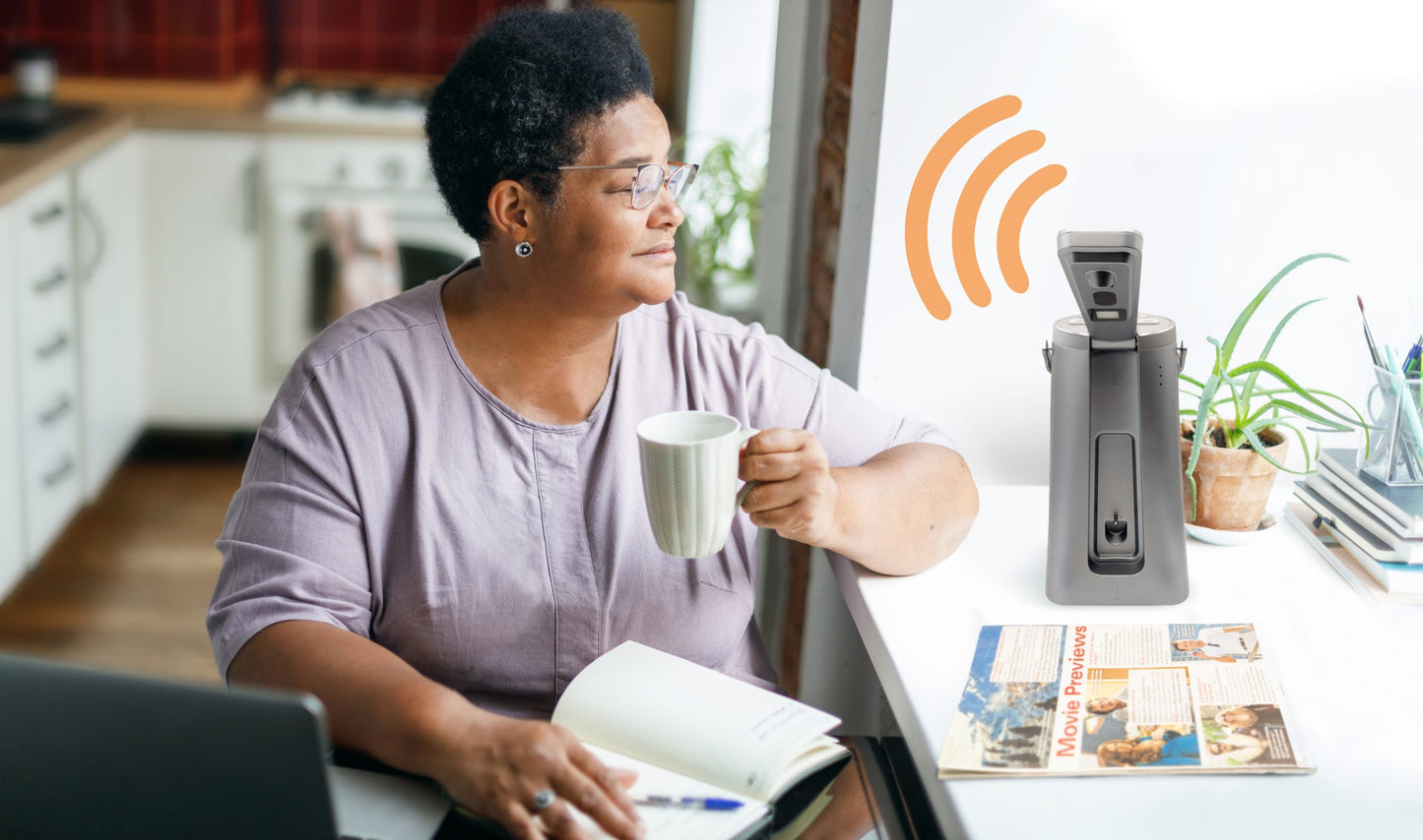 Odyssey, the desktop text-to-speech device, Featuring easy voice commands assisting senior visually impaired user