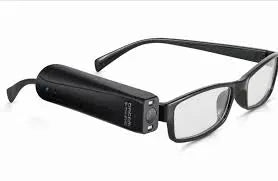 A pair of eyeglasses with the OrCam MyEye device attached, emphasizing the device's compact and discreet design.