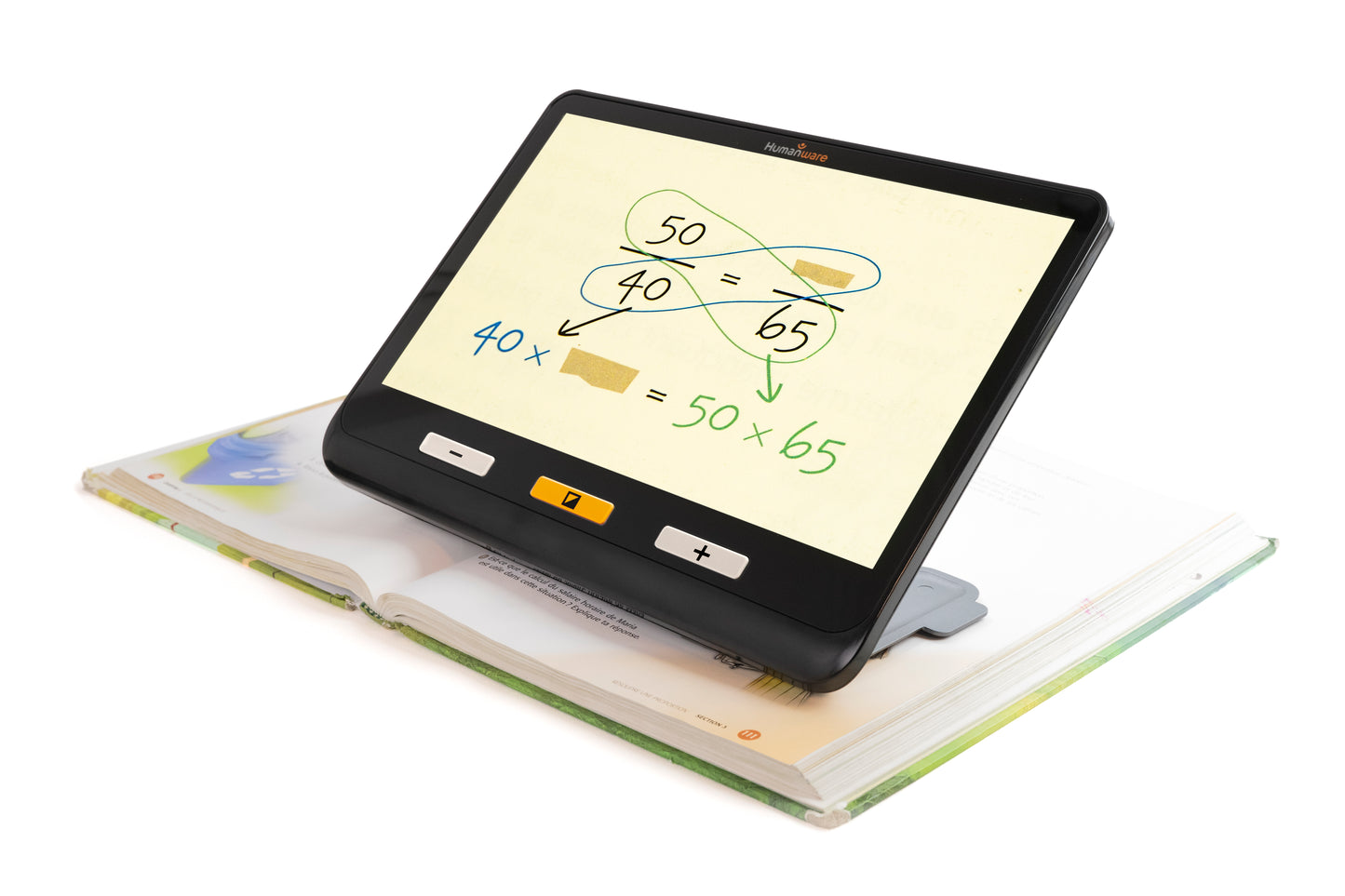 A Humanware Explore 12 portable video magnifier is magnifying a math equation written on a piece of paper.